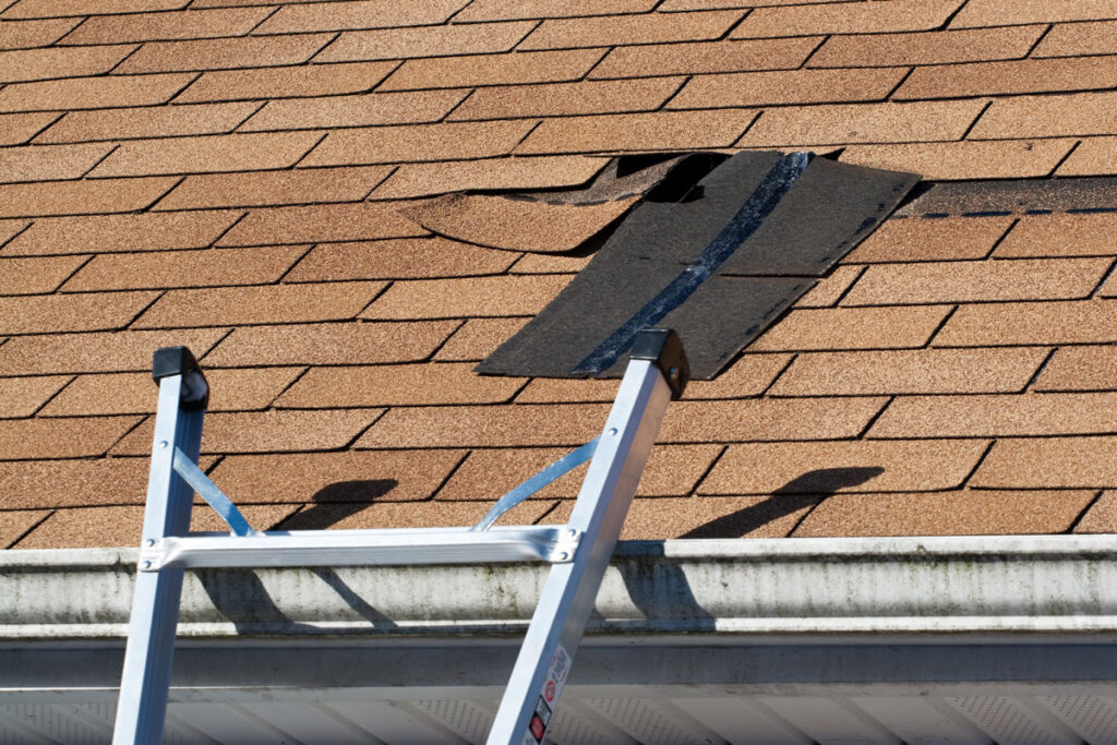 a damaged roof in need of Roof Tarp in Arlington Heights, Chicago, Northfield, Mt. Prospect, Harwood Heights, Des Plaines and Nearby Cities